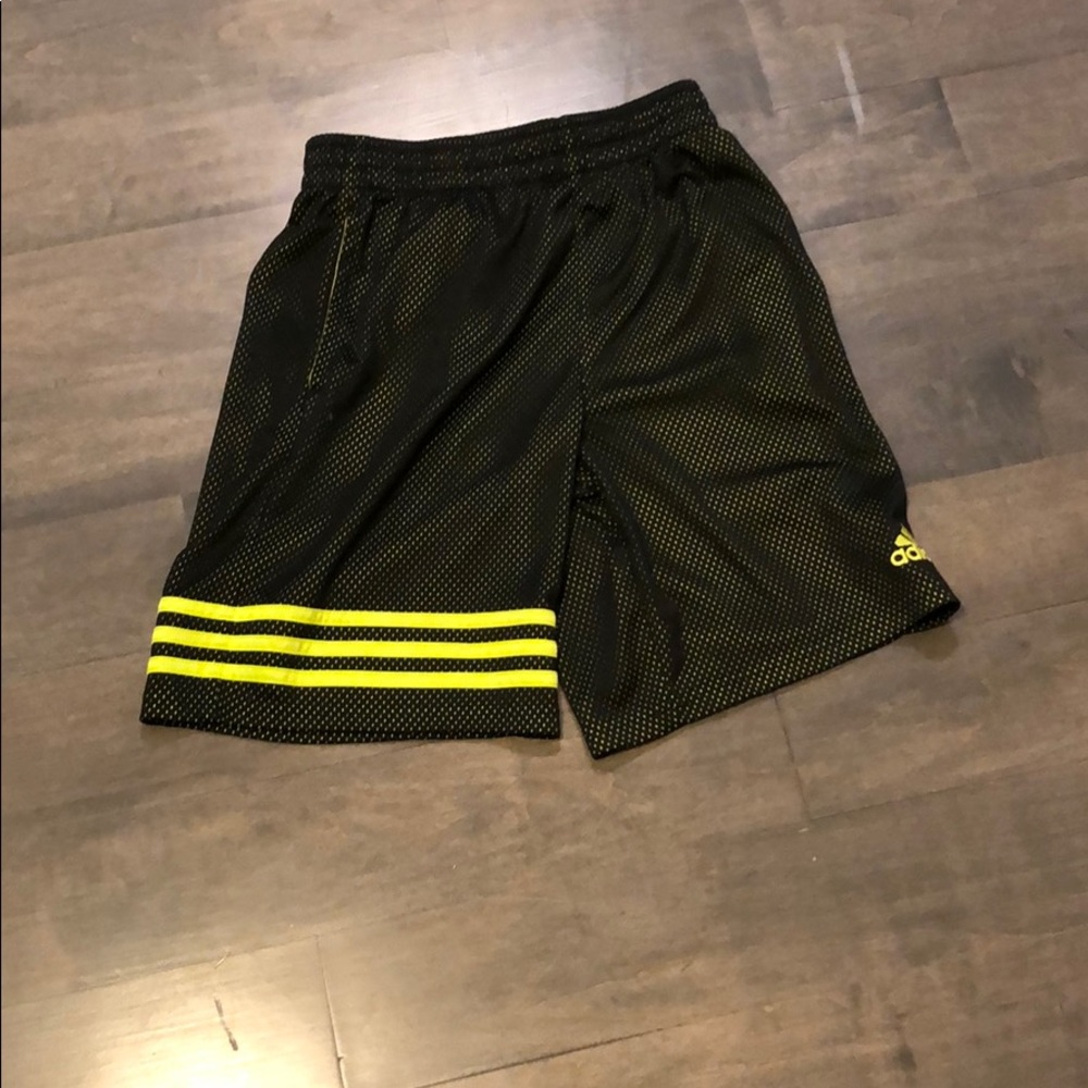 Neon green and black adidas shorts